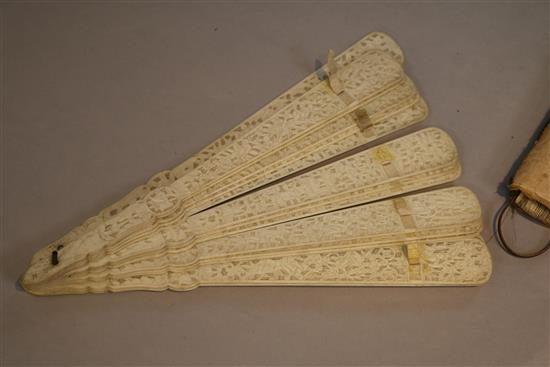 Two Chinese ivory fans and an embroidered fan case